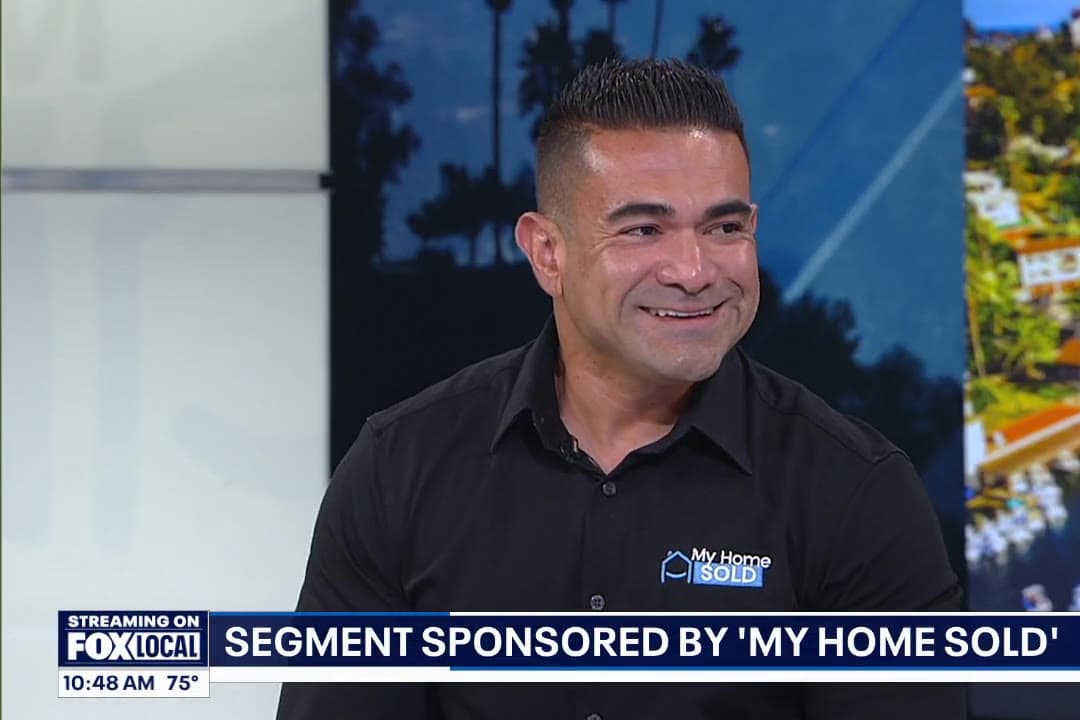 Adrian Hernandez, founder of My Home Sold, on the FOX 11 Good Day LA set during his segment on the Southern California housing market